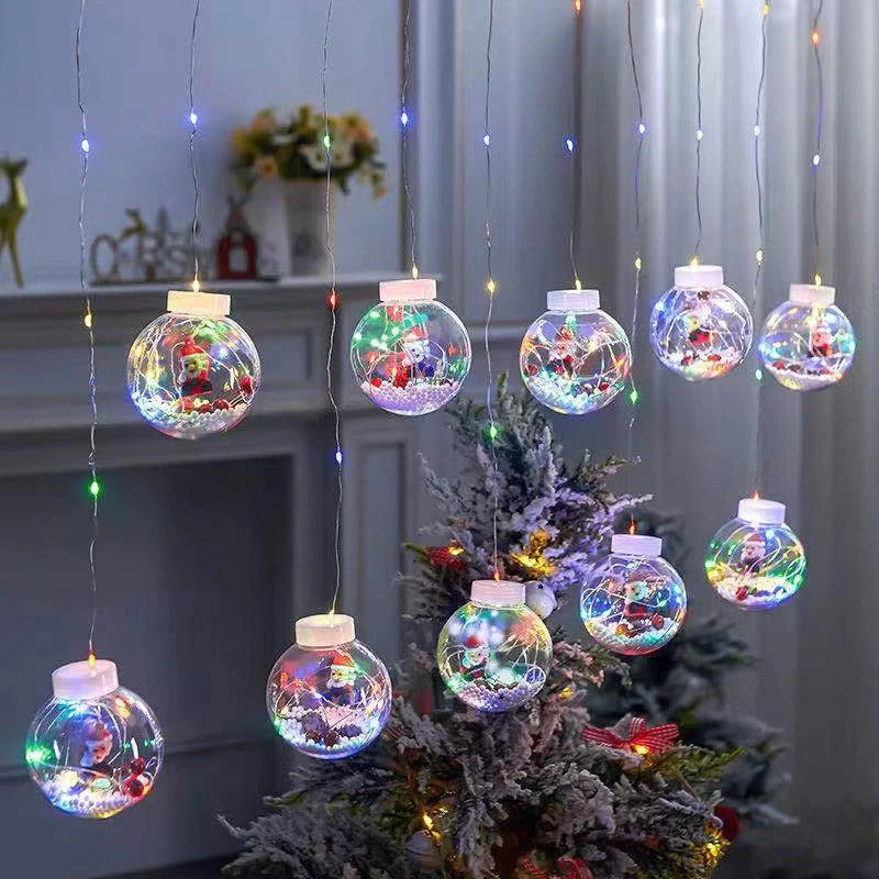 Instalace typu vánoční světelný závěs s koulemi a figurkami, 3M